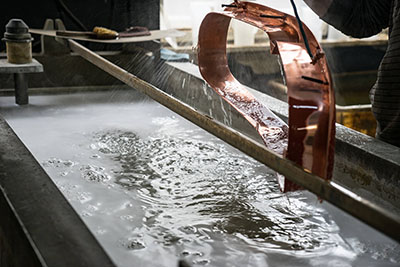 Adhesive Masking in electroplating bath